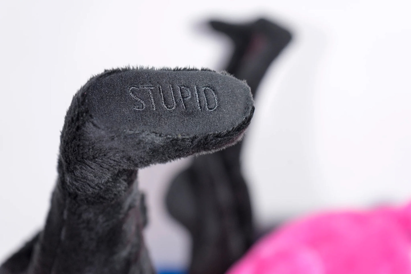 I Am Stupid Fluffy Black print by Robert Panda on sale at Underdogs gallery
