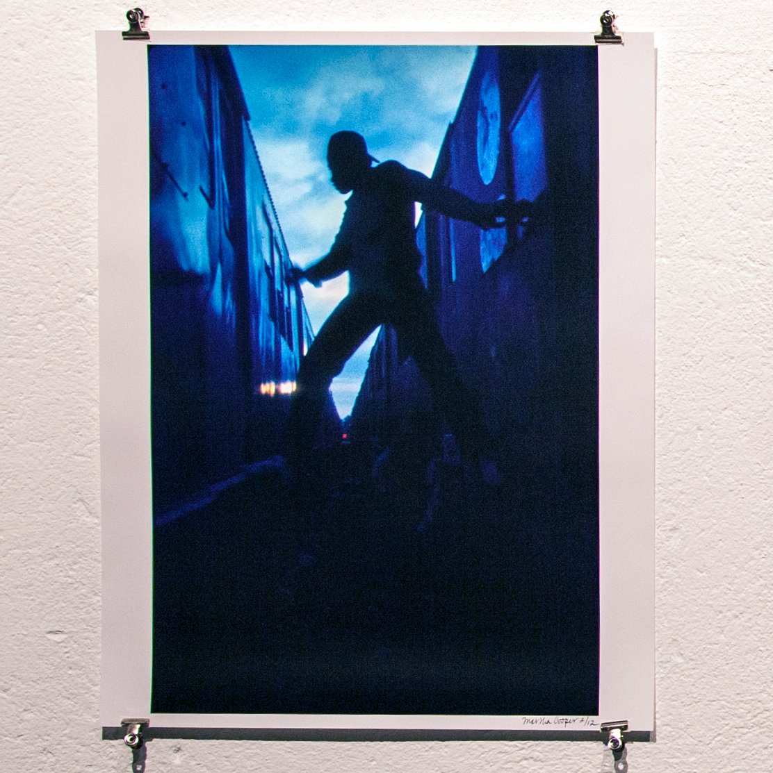 Dondi in Silhouette Painting Train in New Lots Yards, Brooklyn