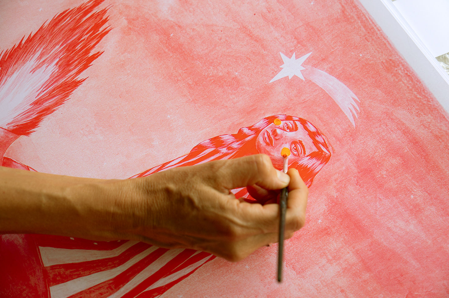 Detail – hand finishing artwork, brush on red print