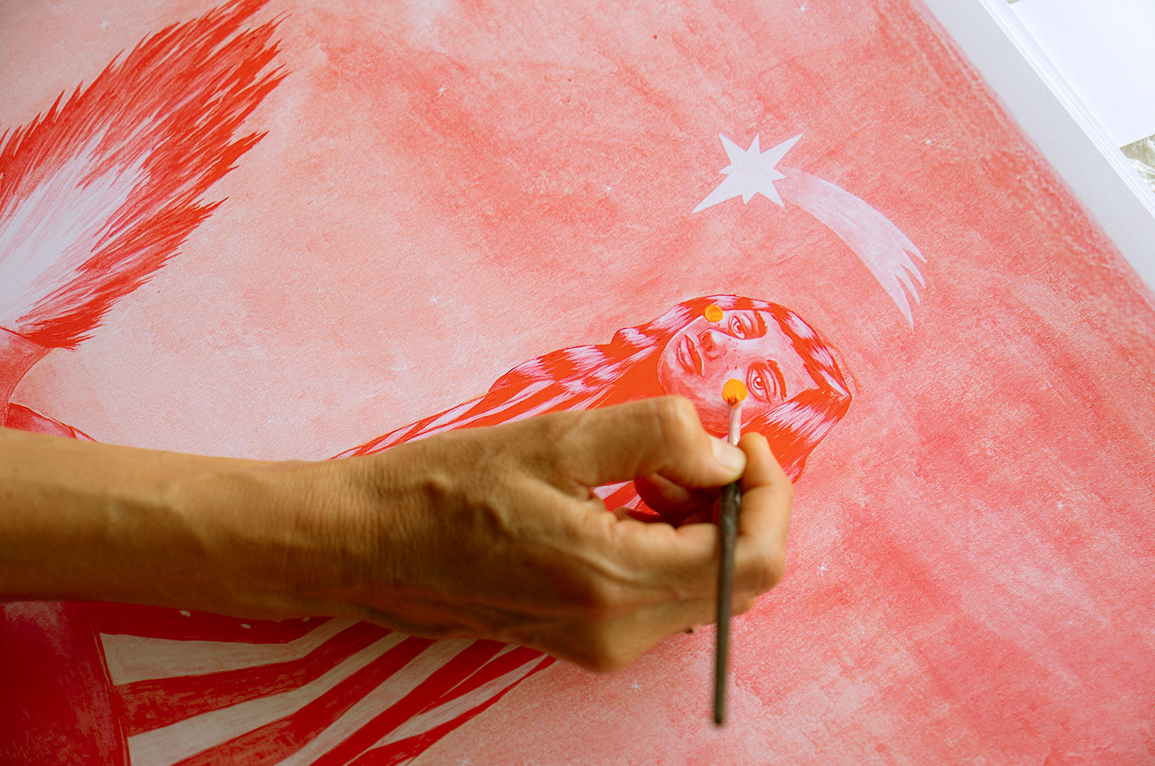 Detail – hand finishing artwork, brush on red print