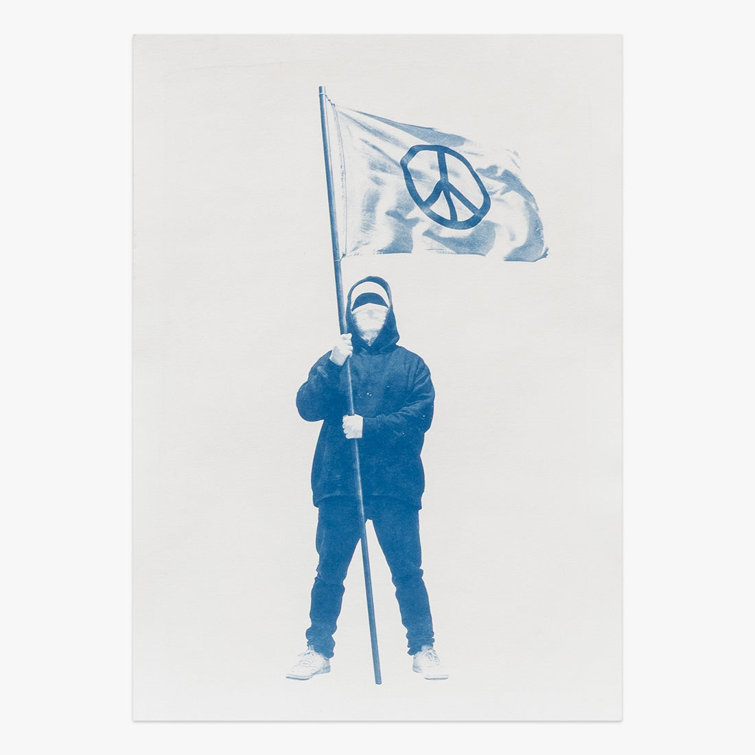 Writer x Peace Flag I by Nuno Viegas, cyanotype print featuring a figure holding a peace symbol flag at Underdogs Gallery