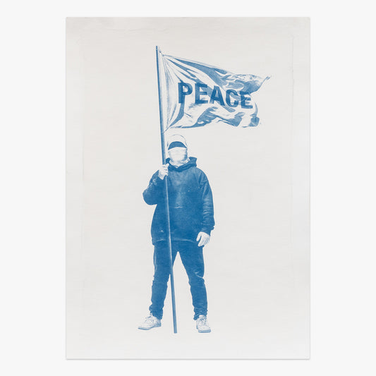 Writer x Peace Flag II by Nuno Viegas, cyanotype print featuring a figure holding a PEACE flag in blue tones at Underdogs Gallery