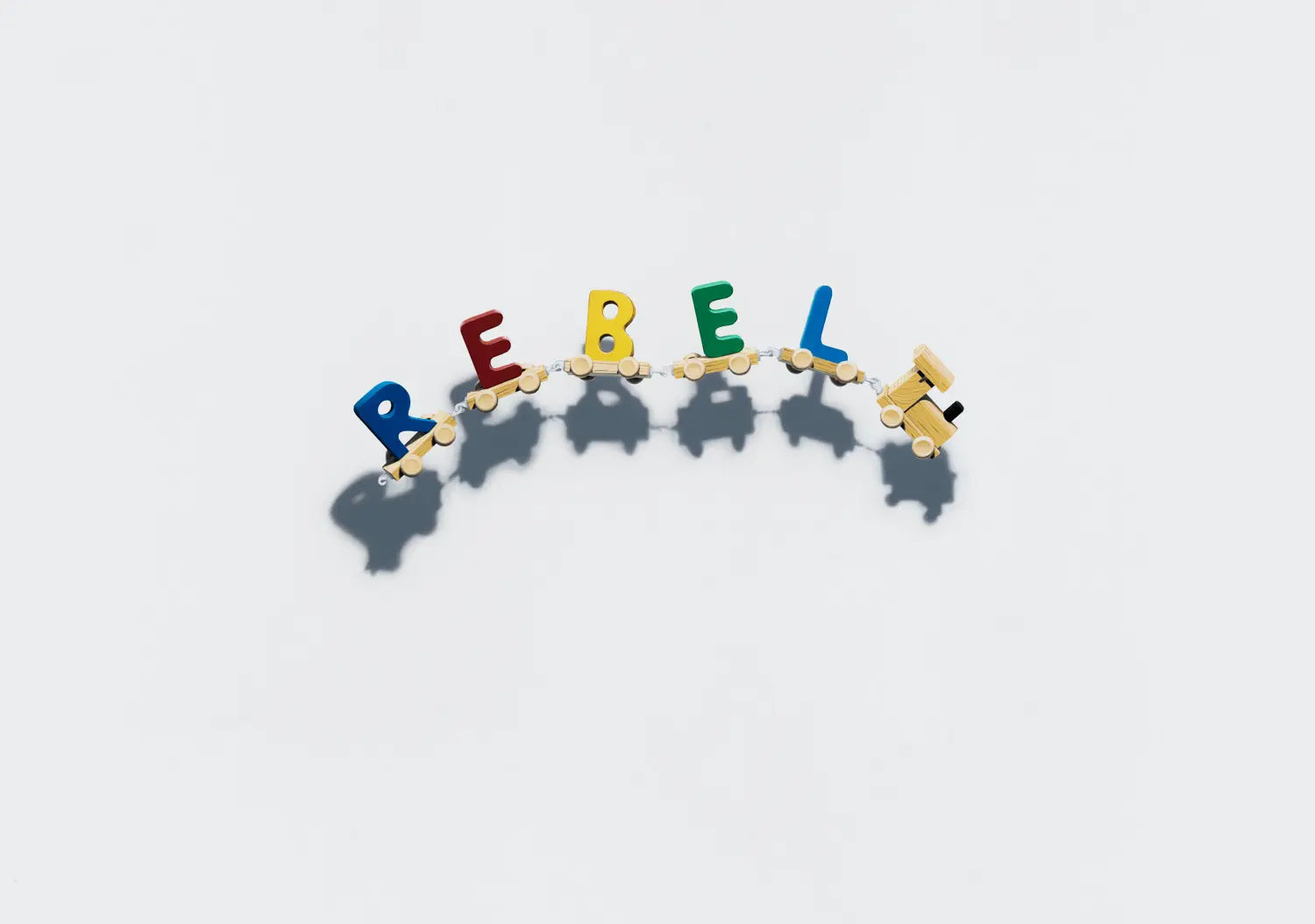 Toy Train Rebel by Nuno Viegas, colorful acrylic typography artwork spelling “REBEL” with toy train-inspired letters and soft shadows on white background, limited edition canvas artwork