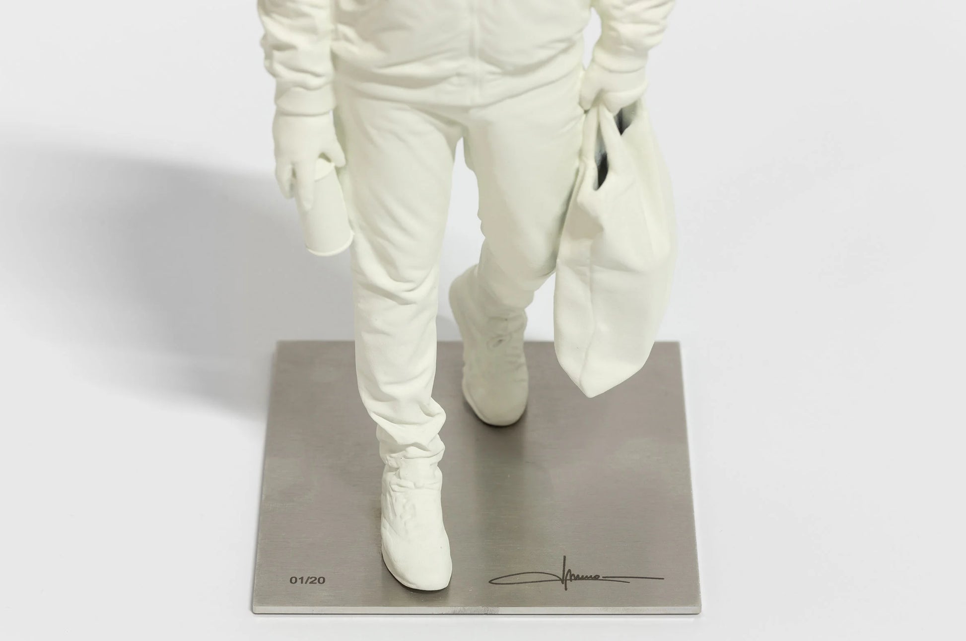 Angled view of Writer III sculpture by Nuno Viegas highlighting posture and silhouette