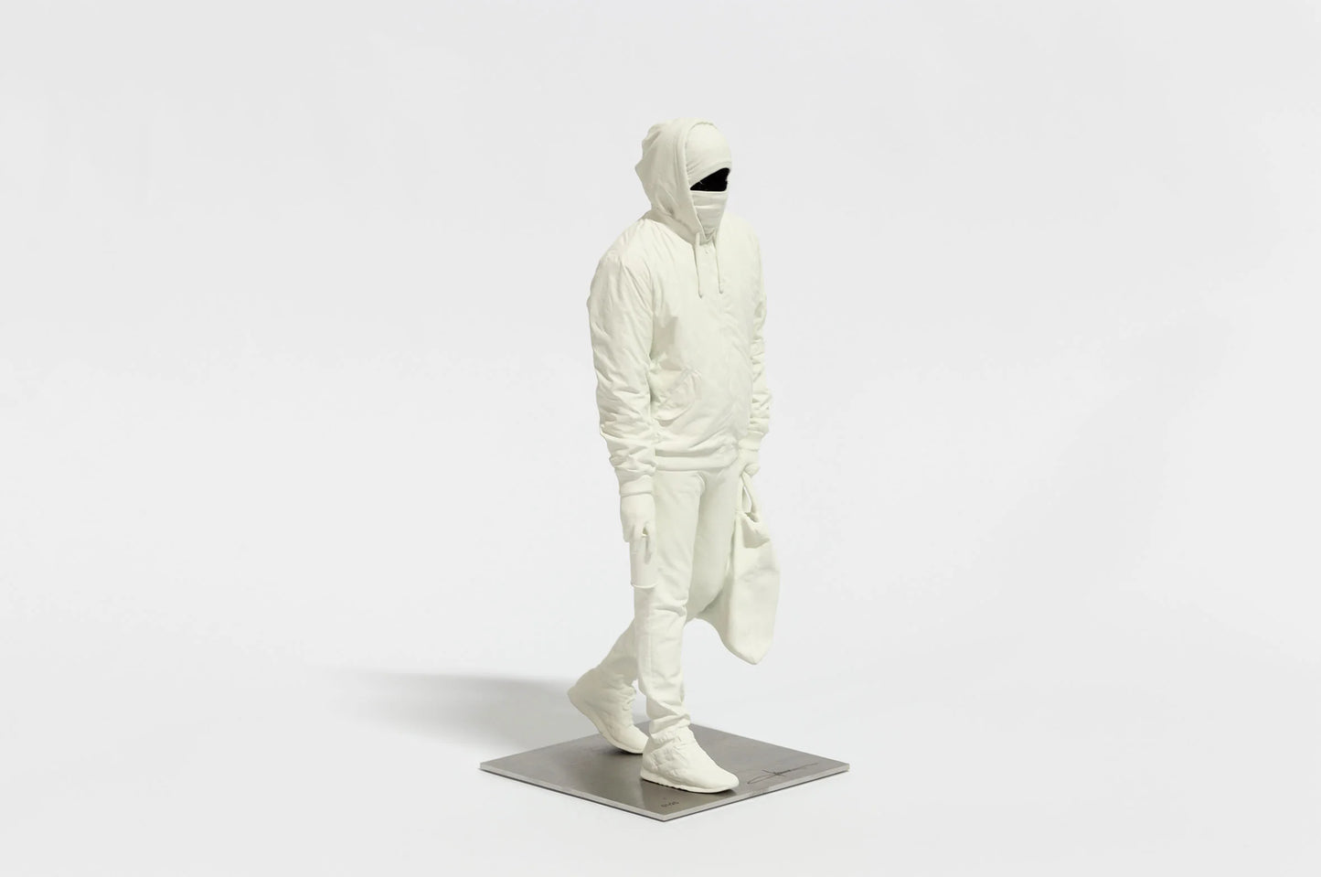 Front view of Writer III sculpture by Nuno Viegas showing full figure proportions on base