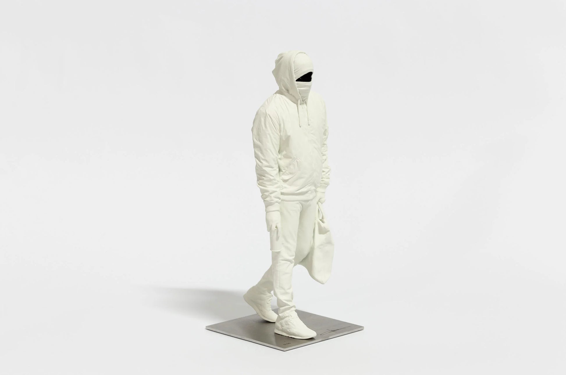 Front view of Writer III sculpture by Nuno Viegas showing full figure proportions on base