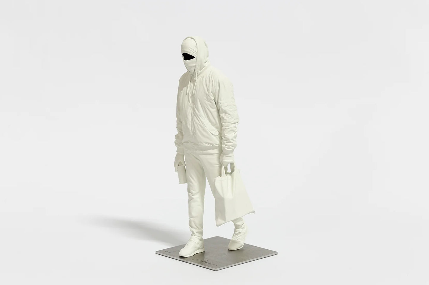 Close-up of Writer III sculpture by Nuno Viegas focusing on the hooded head and upper body