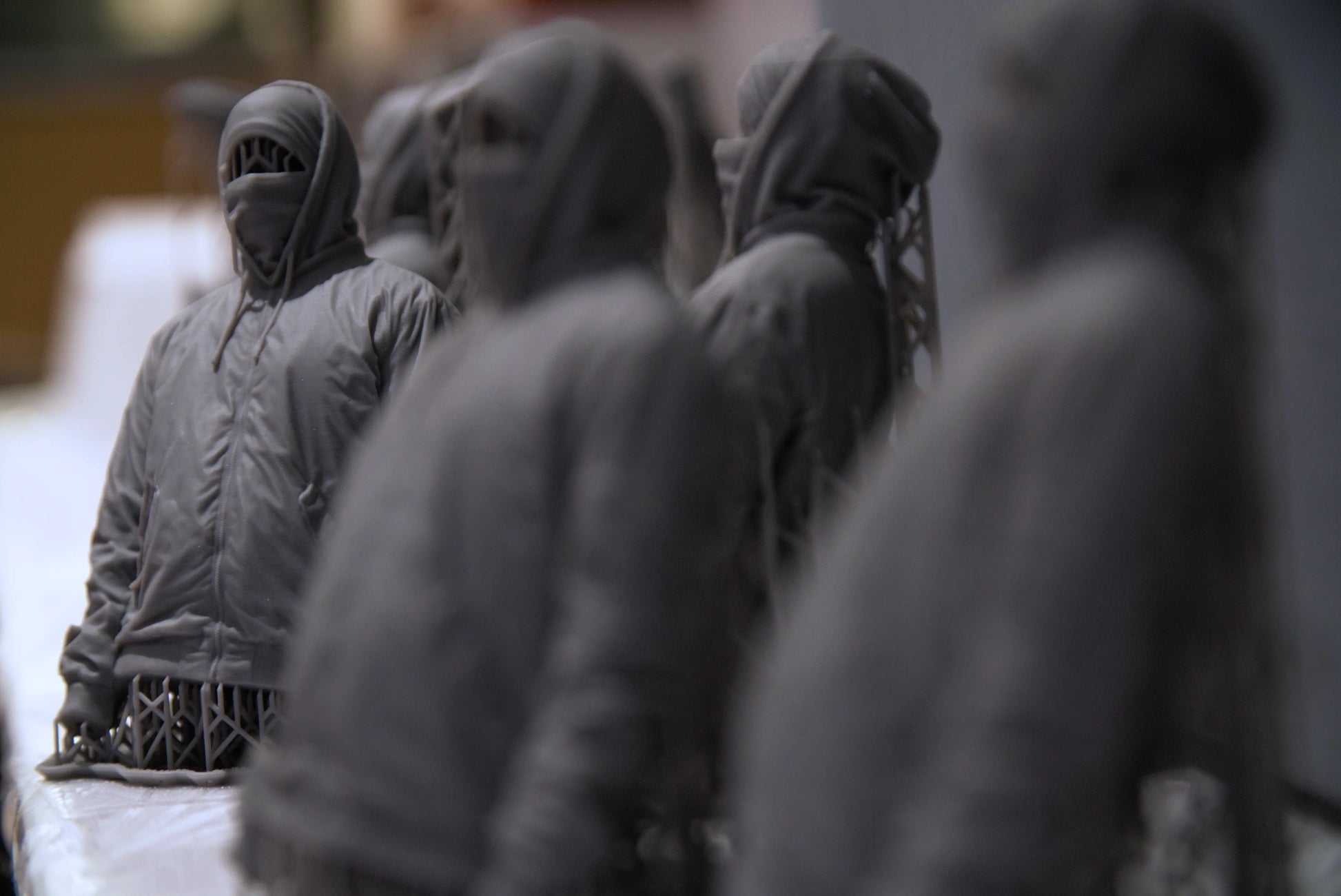 Multiple Writer III sculptures by Nuno Viegas displayed together as a limited edition series