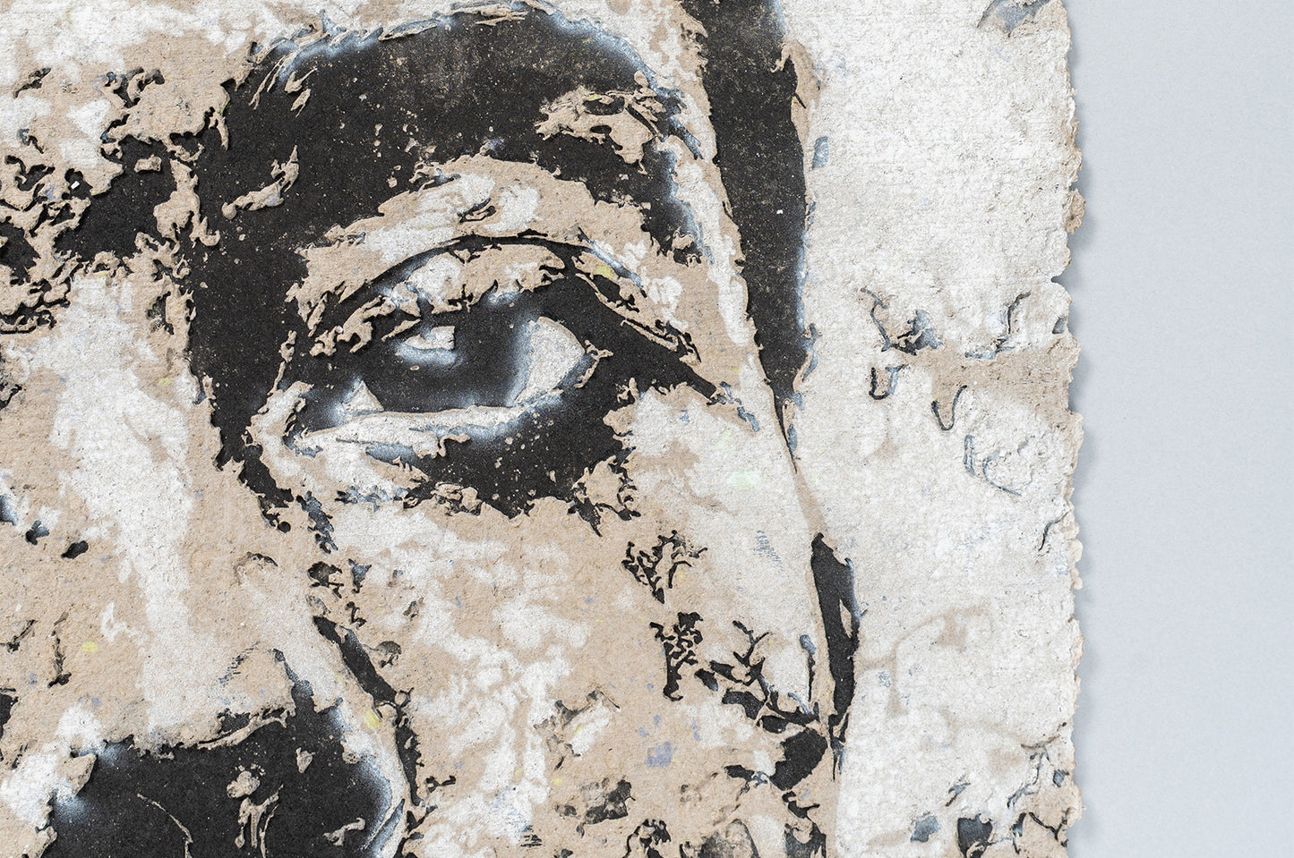 Eye detail of Lexicon by Vhils – papier-mâché artwork, Underdogs Gallery